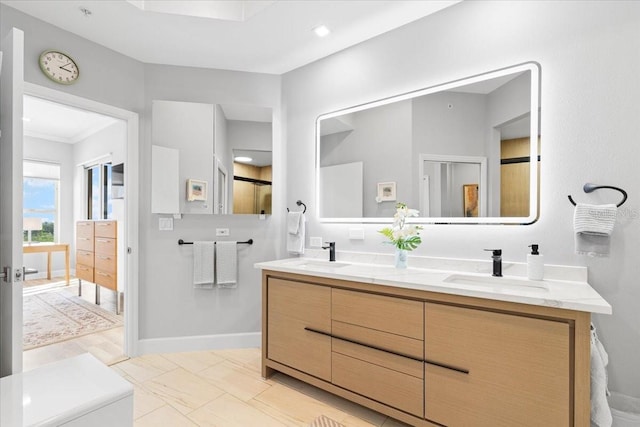 5450 Eagles Point Cir Unit 404, Sarasota, FL 34231 - full bath with double vanity and baseboards