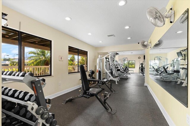 5450 Eagles Point Cir Unit 404, Sarasota, FL 34231 - workout area featuring recessed lighting and baseboards