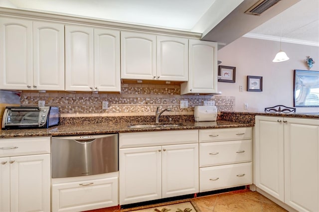 3806 Gulf Of Mexico Dr Unit C204, Longboat Key, FL 34228 - kitchen with a sink, dishwasher, crown molding, decorative backsplash, and dark stone countertops