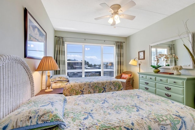 3806 Gulf Of Mexico Dr Unit C204, Longboat Key, FL 34228 - bedroom with a ceiling fan
