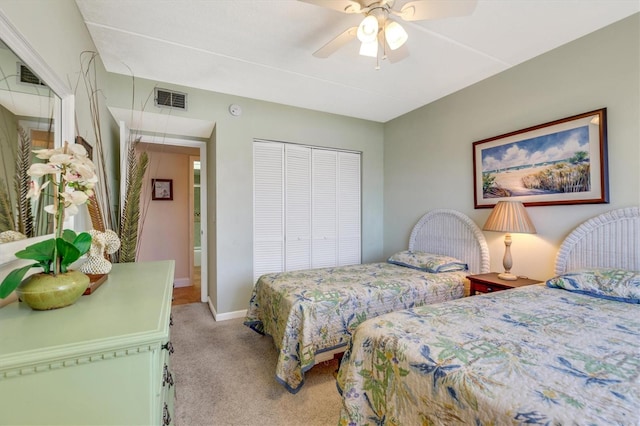 3806 Gulf Of Mexico Dr Unit C204, Longboat Key, FL 34228 - bedroom featuring carpet, a closet, baseboards, and a ceiling fan