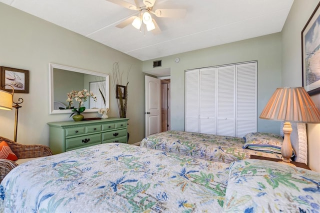 3806 Gulf Of Mexico Dr Unit C204, Longboat Key, FL 34228 - bedroom with a closet and ceiling fan