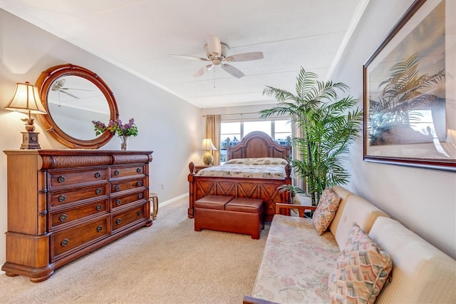 3806 Gulf Of Mexico Dr Unit C204, Longboat Key, FL 34228 - bedroom featuring light carpet, ornamental molding, baseboards, and ceiling fan
