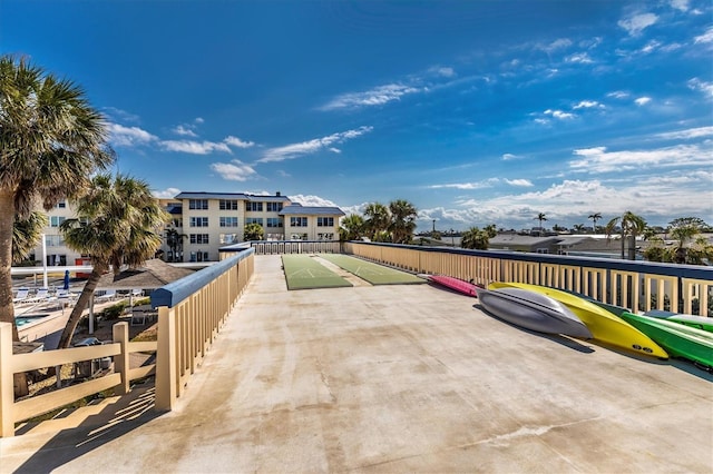 3806 Gulf Of Mexico Dr Unit C204, Longboat Key, FL 34228 - view of patio / terrace with shuffleboard