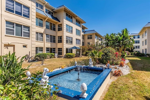 3806 Gulf Of Mexico Dr Unit C204, Longboat Key, FL 34228 - view of swimming pool with a yard