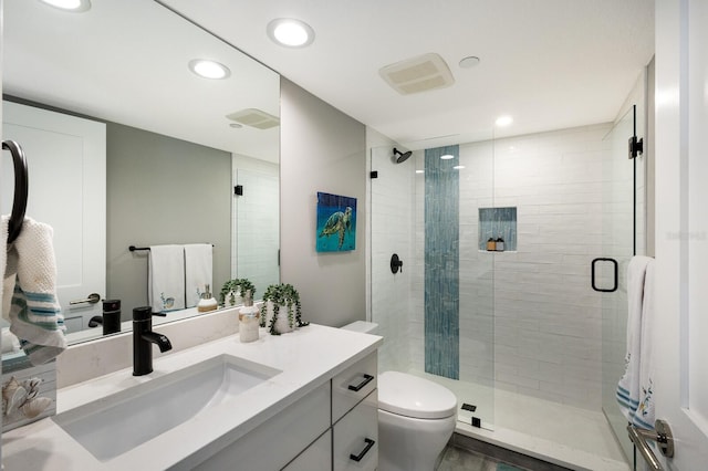1445 Gulf Of Mexico Dr Unit 203, Longboat Key, FL 34228 - bathroom featuring vanity, a shower stall, and recessed lighting