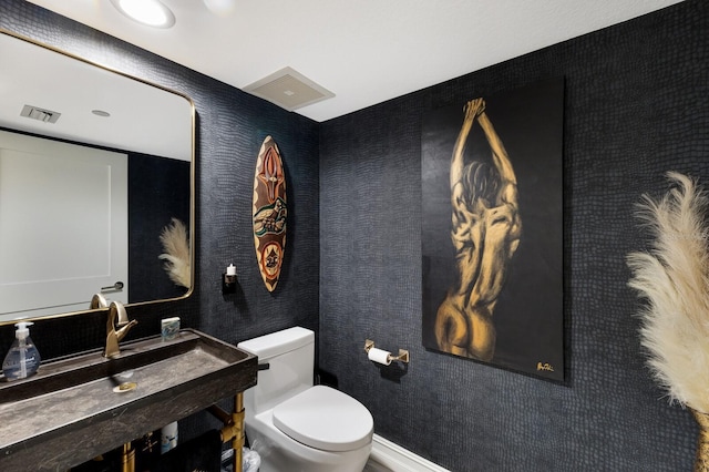 1445 Gulf Of Mexico Dr Unit 203, Longboat Key, FL 34228 - half bath featuring toilet and vanity