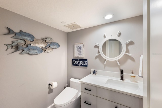 1445 Gulf Of Mexico Dr Unit 203, Longboat Key, FL 34228 - bathroom with vanity and toilet