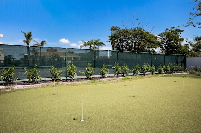 1445 Gulf Of Mexico Dr Unit 203, Longboat Key, FL 34228 - view of tennis court featuring a putting green