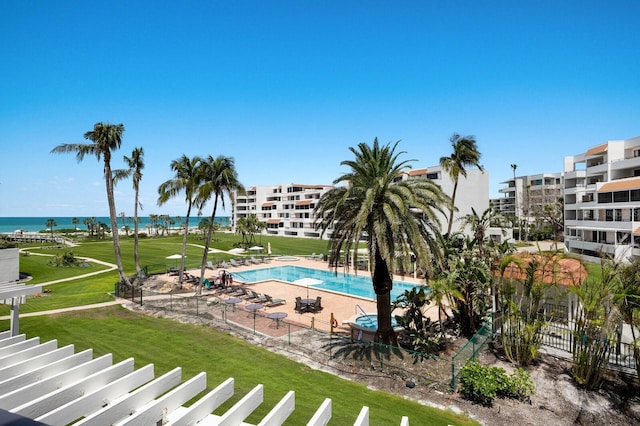 1445 Gulf Of Mexico Dr Unit 203, Longboat Key, FL 34228 - community pool with a water view and a patio area