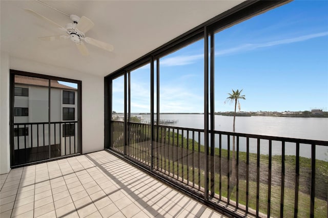 3630 Gulf Of Mexico Dr Unit 202, Longboat Key, FL 34228 - unfurnished sunroom with a water view