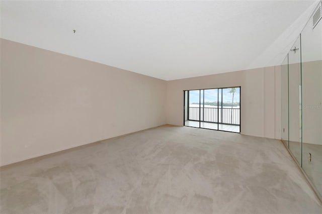 3630 Gulf Of Mexico Dr Unit 202, Longboat Key, FL 34228 - empty room featuring light carpet