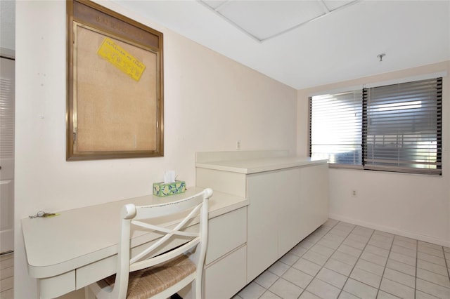 3630 Gulf Of Mexico Dr Unit 202, Longboat Key, FL 34228 - dining room featuring light tile patterned floors and baseboards