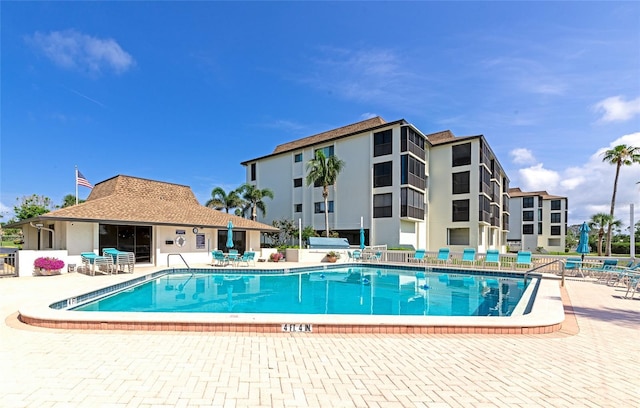3630 Gulf Of Mexico Dr Unit 202, Longboat Key, FL 34228 - community pool featuring a patio