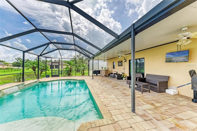 7410 61st St E, Palmetto, FL 34221 - outdoor pool with ceiling fan, a patio area, an outdoor hangout area, and glass enclosure