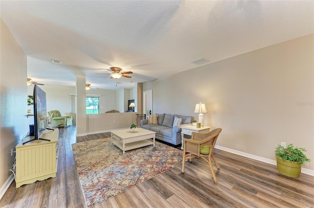 7410 61st St E, Palmetto, FL 34221 - living room featuring wood finished floors and ceiling fan