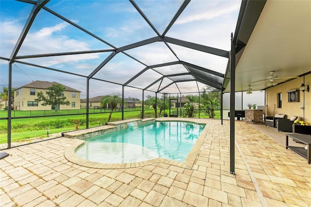 7410 61st St E, Palmetto, FL 34221 - swimming pool featuring a patio, ceiling fan, outdoor lounge area, a yard, and a lanai