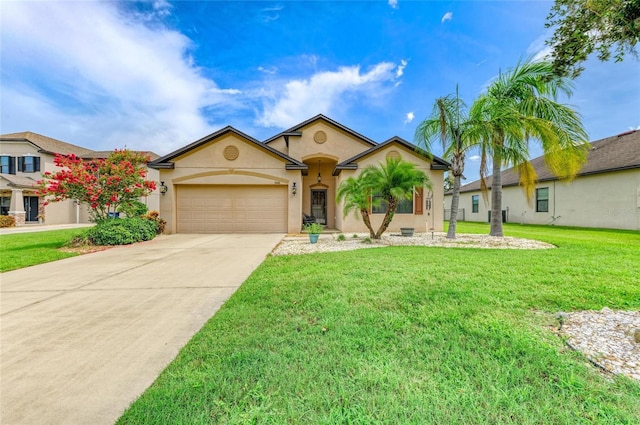 7410 61st St E, Palmetto, FL 34221 - view of front of property featuring stucco siding, concrete driveway, a garage, and a front lawn