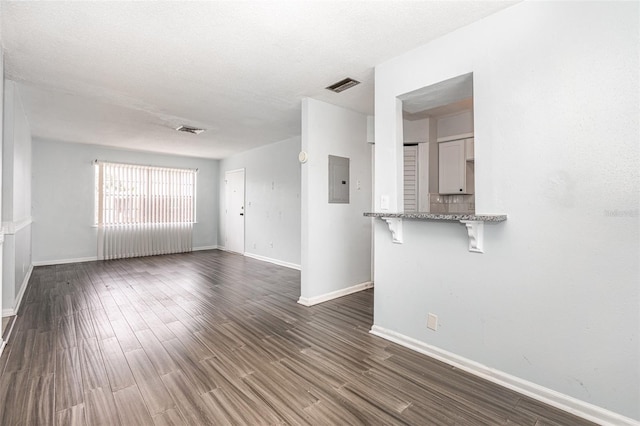 4507 9th St W Unit A2, Bradenton, FL 34207 - spare room featuring dark wood finished floors and electric panel