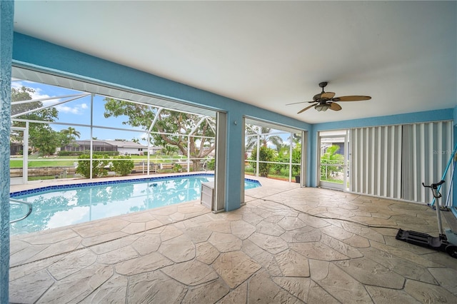 1314 SE 15th Ter, Cape Coral, FL 33990 - swimming pool with a ceiling fan, a patio, and glass enclosure