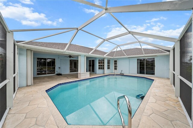1314 SE 15th Ter, Cape Coral, FL 33990 - swimming pool with a patio, ceiling fan, and a lanai