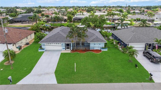 1314 SE 15th Ter, Cape Coral, FL 33990 - aerial perspective of suburban area