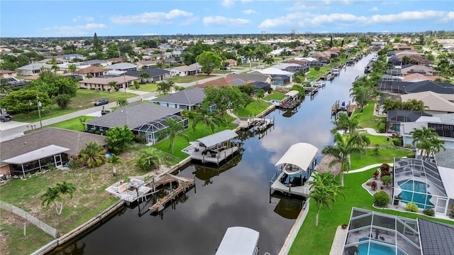 1314 SE 15th Ter, Cape Coral, FL 33990 - aerial perspective of suburban area featuring a large body of water