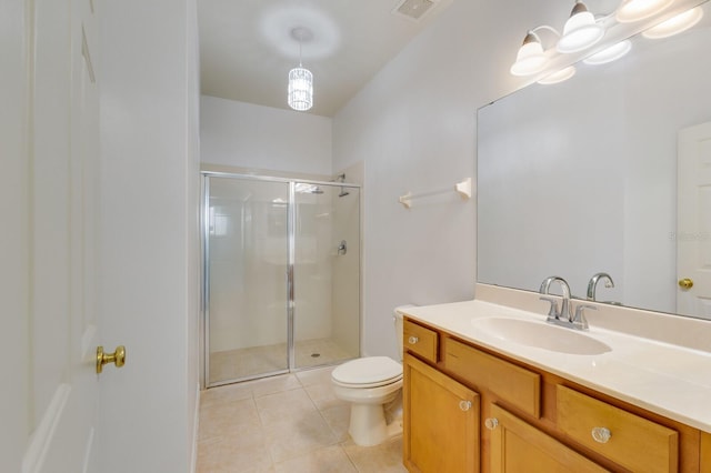 3402 Parkridge Cir, Sarasota, FL 34243 - bathroom featuring toilet, a shower stall, vanity, and tile patterned flooring