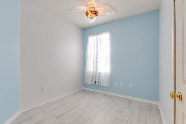 3402 Parkridge Cir, Sarasota, FL 34243 - unfurnished room featuring a ceiling fan, light wood-style flooring, and baseboards