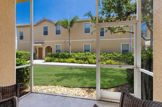 3402 Parkridge Cir, Sarasota, FL 34243 - view of front of home with stucco siding and a front yard