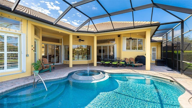 7081 Grassland Ct, Sarasota, FL 34241 - outdoor pool featuring ceiling fan, a patio area, and glass enclosure