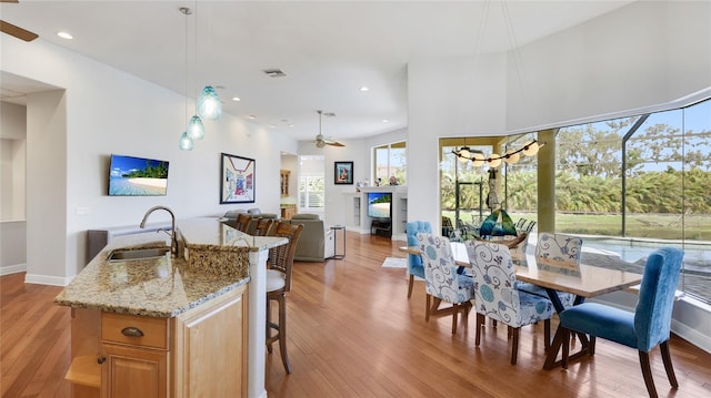 7081 Grassland Ct, Sarasota, FL 34241 - dining space featuring a ceiling fan, light wood-style floors, and recessed lighting