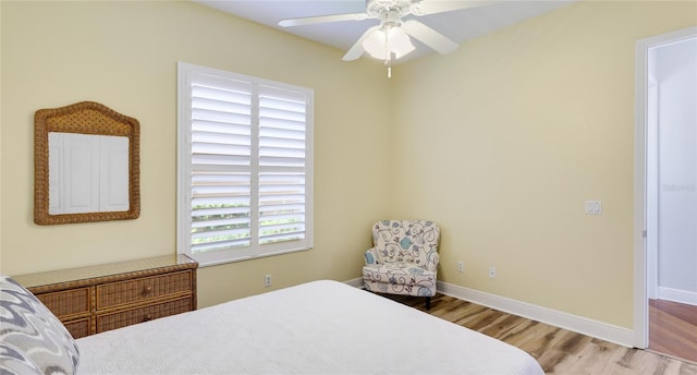 7081 Grassland Ct, Sarasota, FL 34241 - bedroom with wood finished floors and a ceiling fan