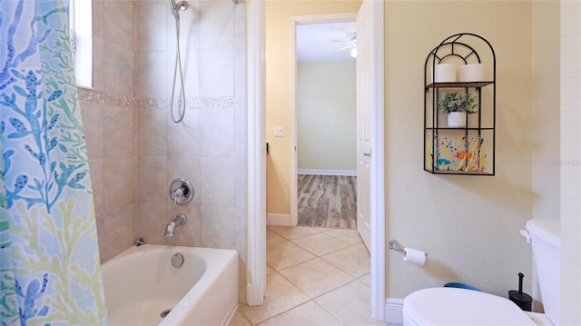 7081 Grassland Ct, Sarasota, FL 34241 - bathroom with shower / tub combo, tile patterned flooring, and a ceiling fan