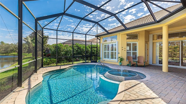 7081 Grassland Ct, Sarasota, FL 34241 - view of swimming pool with a patio area, a pool with connected hot tub, glass enclosure, and a water view
