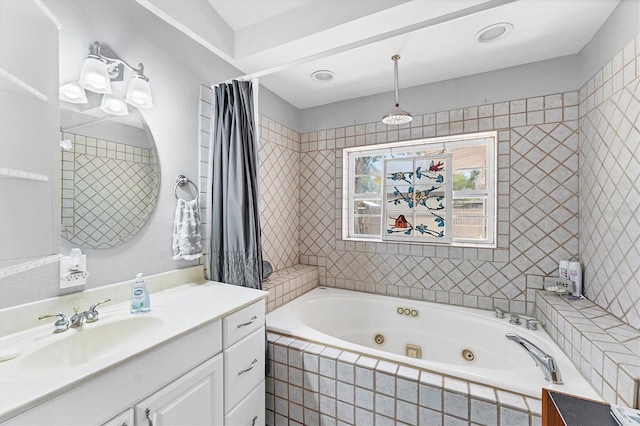 304 34th St W, Bradenton, FL 34205 - bathroom featuring a tub with jets, vanity, and a shower with shower curtain