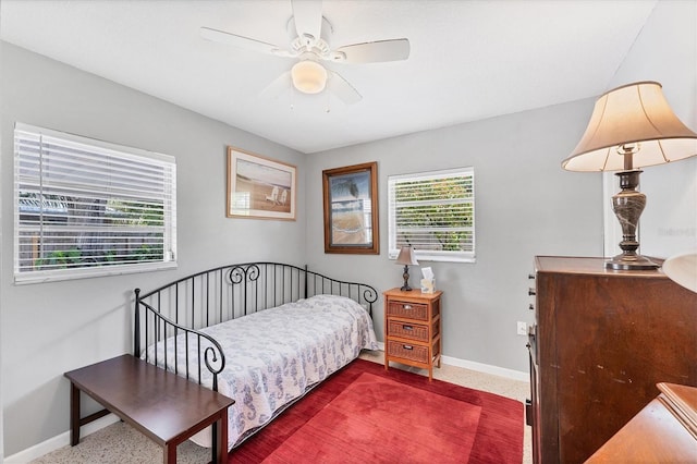 304 34th St W, Bradenton, FL 34205 - bedroom with baseboards, speckle patterned floor, and ceiling fan