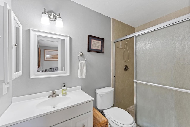 304 34th St W, Bradenton, FL 34205 - full bath featuring toilet, vanity, and a stall shower