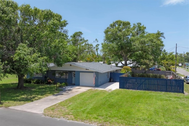 304 34th St W, Bradenton, FL 34205 - view of front facade with an attached garage and driveway