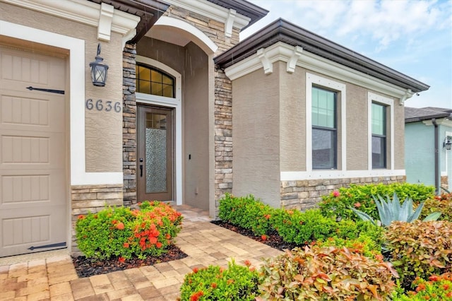 6636 35th Ct E, Sarasota, FL 34243 - entrance to property with stone siding and stucco siding