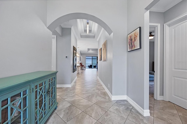 6636 35th Ct E, Sarasota, FL 34243 - hall featuring arched walkways, ornamental molding, and baseboards