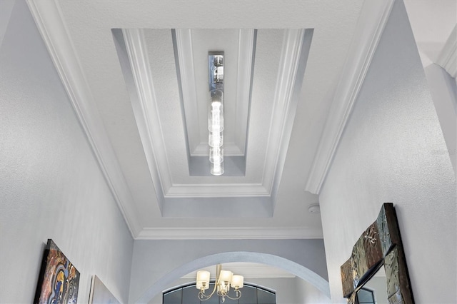 6636 35th Ct E, Sarasota, FL 34243 - detailed view of a chandelier, arched walkways, and stucco siding