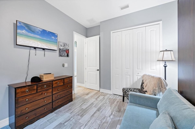 6636 35th Ct E, Sarasota, FL 34243 - sitting room with light wood-style floors and baseboards