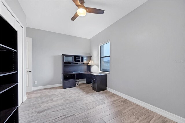 6636 35th Ct E, Sarasota, FL 34243 - office featuring ceiling fan, light wood-style flooring, baseboards, and vaulted ceiling