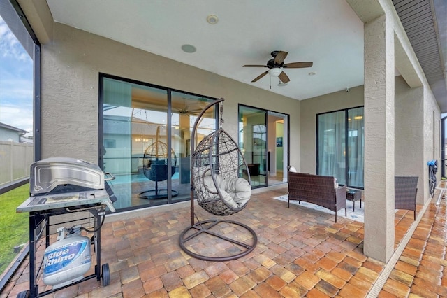 6636 35th Ct E, Sarasota, FL 34243 - view of patio featuring a ceiling fan and a grill