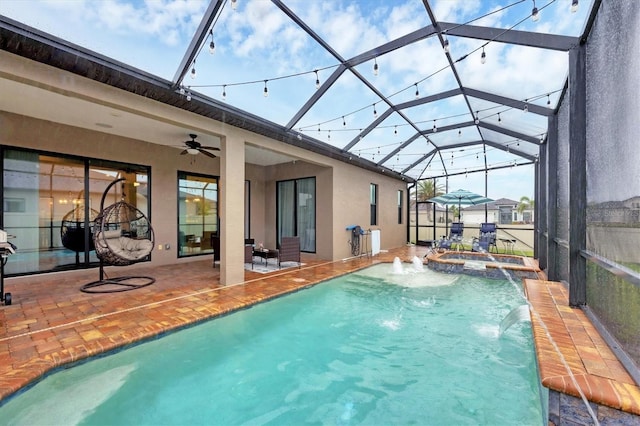 6636 35th Ct E, Sarasota, FL 34243 - view of swimming pool featuring ceiling fan, a patio area, a pool with connected hot tub, and a lanai