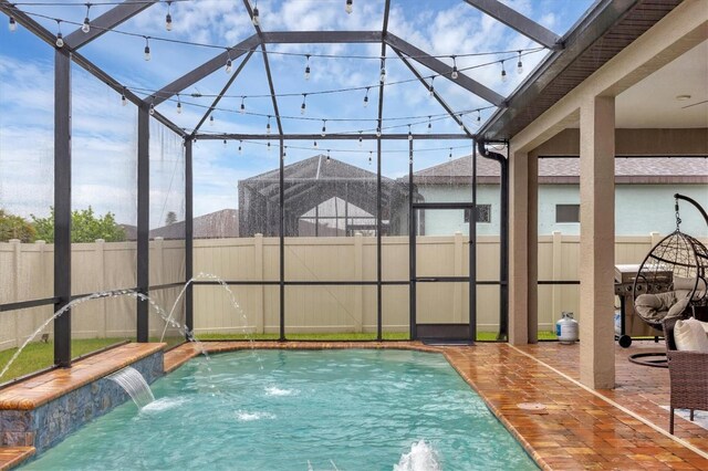 6636 35th Ct E, Sarasota, FL 34243 - view of pool with a patio, a lanai, and a fenced backyard