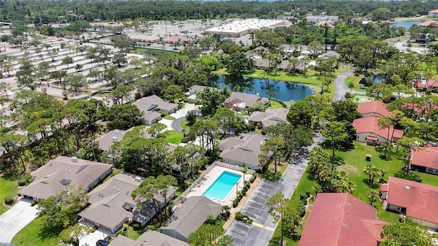 7926 Woodpointe Ct Unit 29, Sarasota, FL 34238 - aerial perspective of suburban area featuring a pool area and a nearby body of water