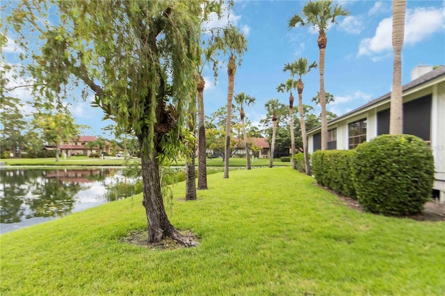 7926 Woodpointe Ct Unit 29, Sarasota, FL 34238 - view of grassy yard with a water view