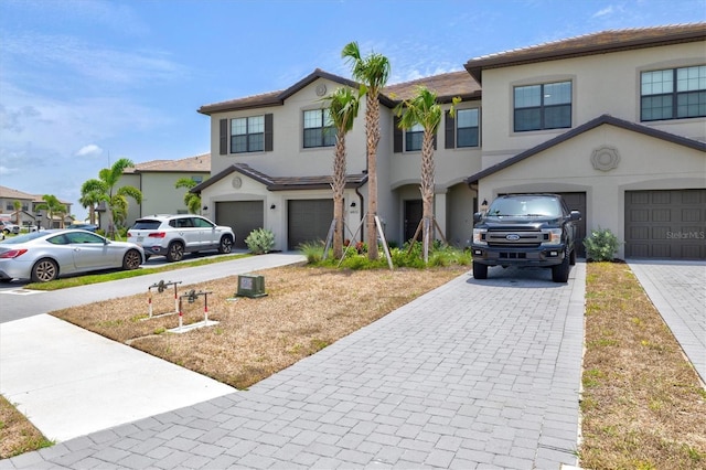 14835 Lyla Ter, Bradenton, FL 34211 - view of property with a garage, driveway, and stucco siding